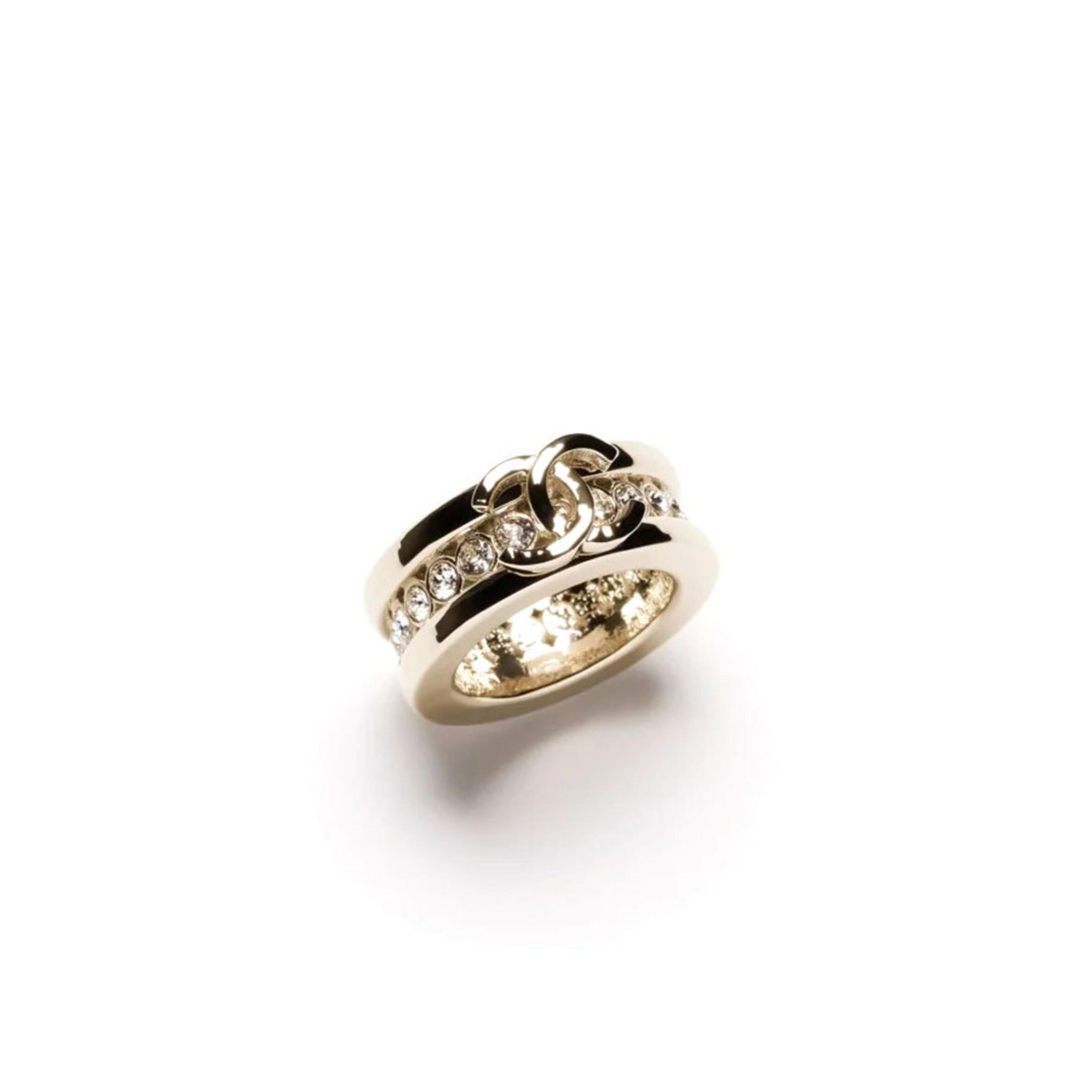 ch**el metal pearl ring encrusted with crystal and G01den cc logo in the middle